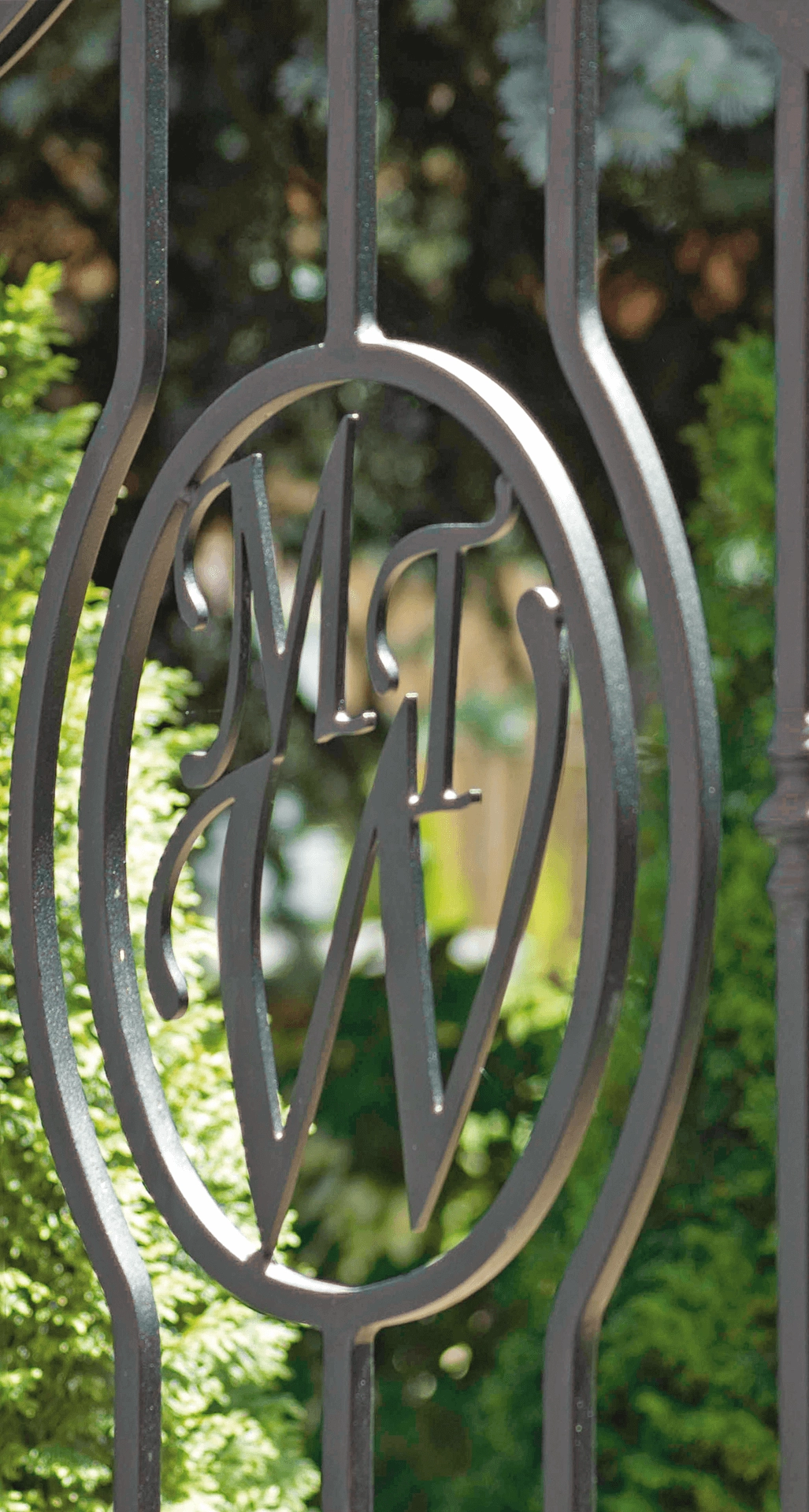 Initials on the fence gate